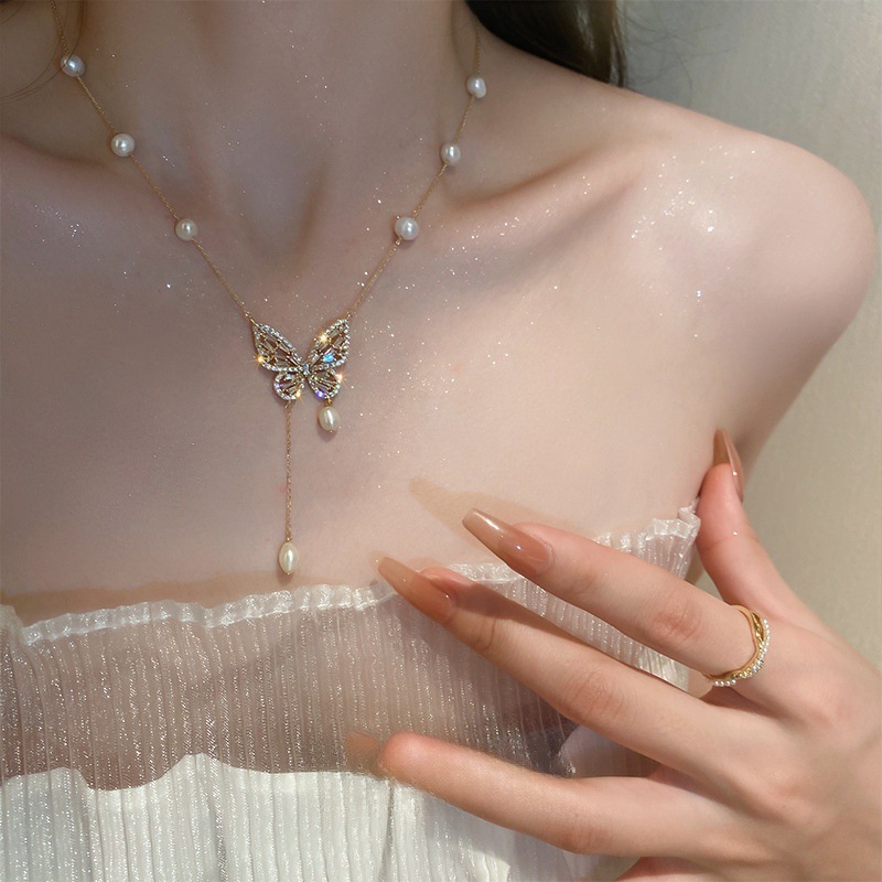 Necklace with butterfly from pearl