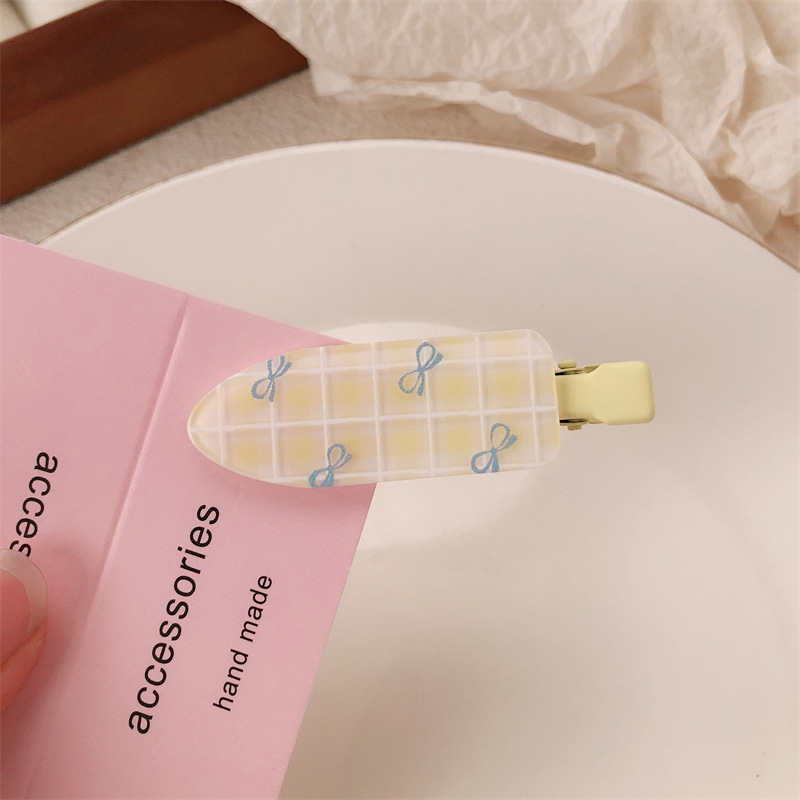 Un par de impresión de arco para niñas pinzas de cabello sin marcas de dibujos animados para mujeres adorables pinzas de cabello para el cabello de bordas rotas