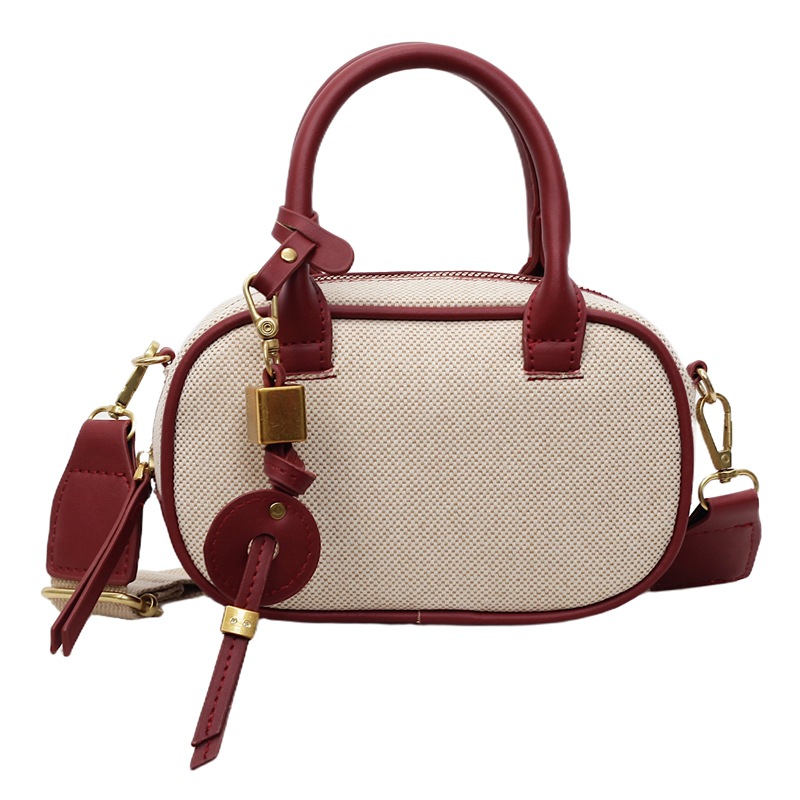 Bolsa de bolos de nicho coreano bolsas de bolos de mano lienzo colgante de color retro de alta calidad bolsas de hombro
