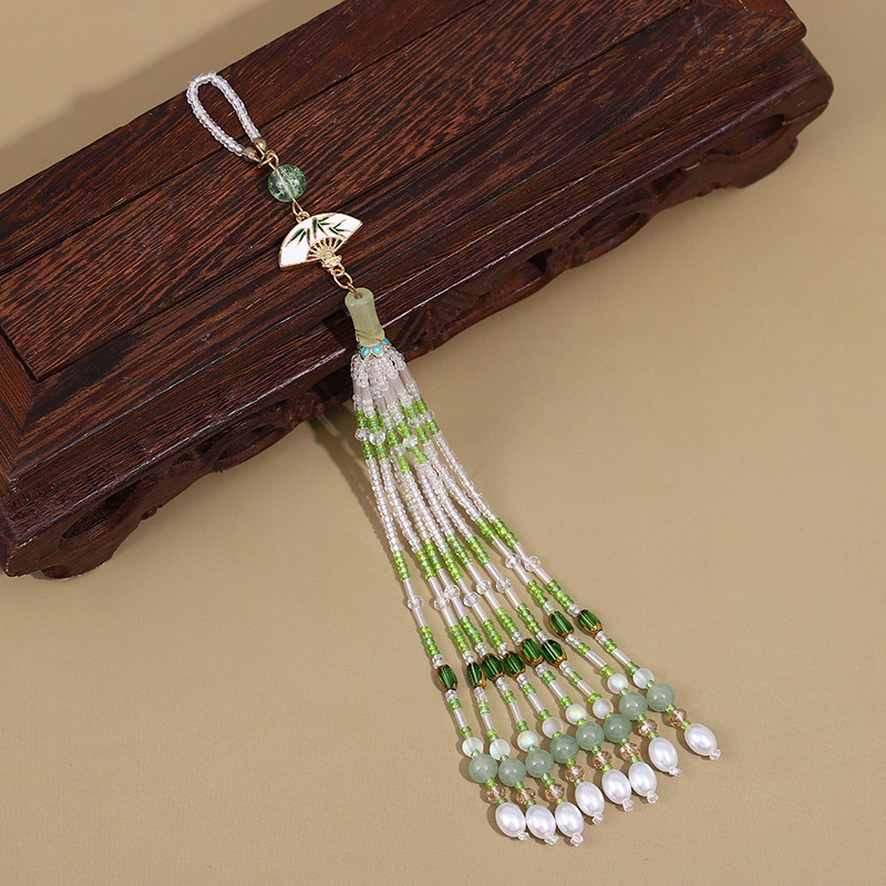 Nuevo estilo chino cheongsam colgante de tapeta de presión femenino de alta gama borla estilo chino Magnolia Ruyi Palace Hanfu Accesorios