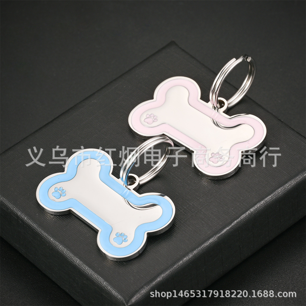 Spot al por mayor de acero inoxidable marca de perro de goteo nuevo hueso de perro marca de mascota fuente transfronteriza de acero de titanio marca anti-pérdida