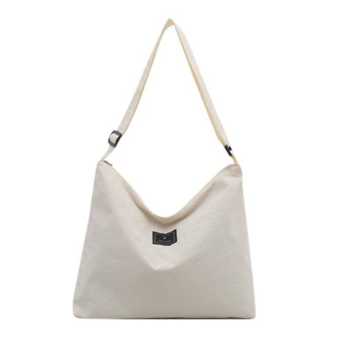 New trendy women's relaxed and minimalist stylish plain nylon tote bag with large capacity for casual single shoulder and crossbody use