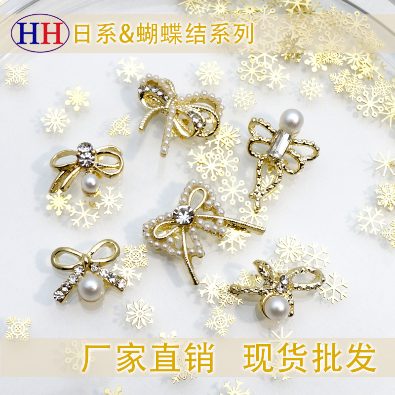 LZ nuevo rojo neto mismo estilo de uñas arco Aleación de uñas joyería arco de uñas de perlas de diamantes fábrica al por mayor