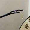 Purple Chinese hairpin flower-shaped