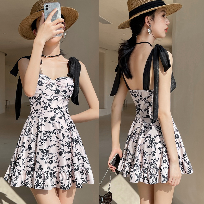 Falda de una sola pieza traje de baño suspender impreso 2023 nuevo pequeño soporte de acero reunido traje de baño de aguas termales al por mayor