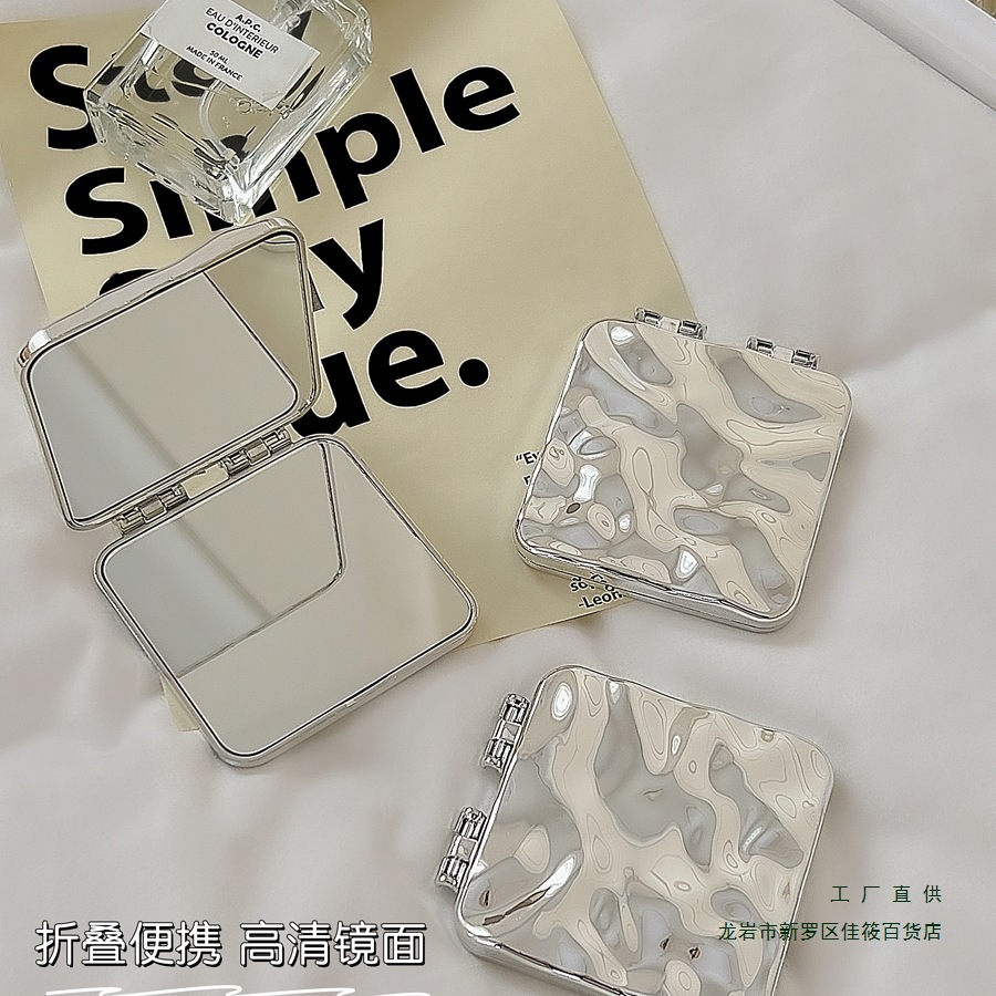 Handheld folding double-sided small mirror