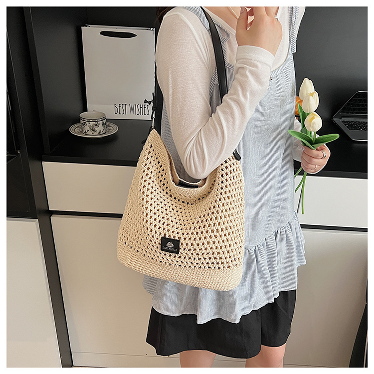 Summer hollowed-out knitted underarm bag for women, 2025 new style, laid-back and relaxed, seaside vacation style single-shoulder crossbody bag undefined