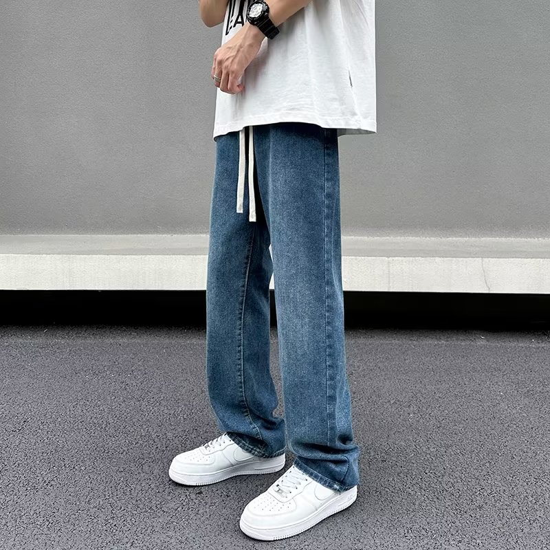 Vaqueros americanos, pantalones teñidos de barro amarillo de seda de hielo viejos lavados de verano para hombres, pantalones rectos sueltos de la marca de moda de la calle principal