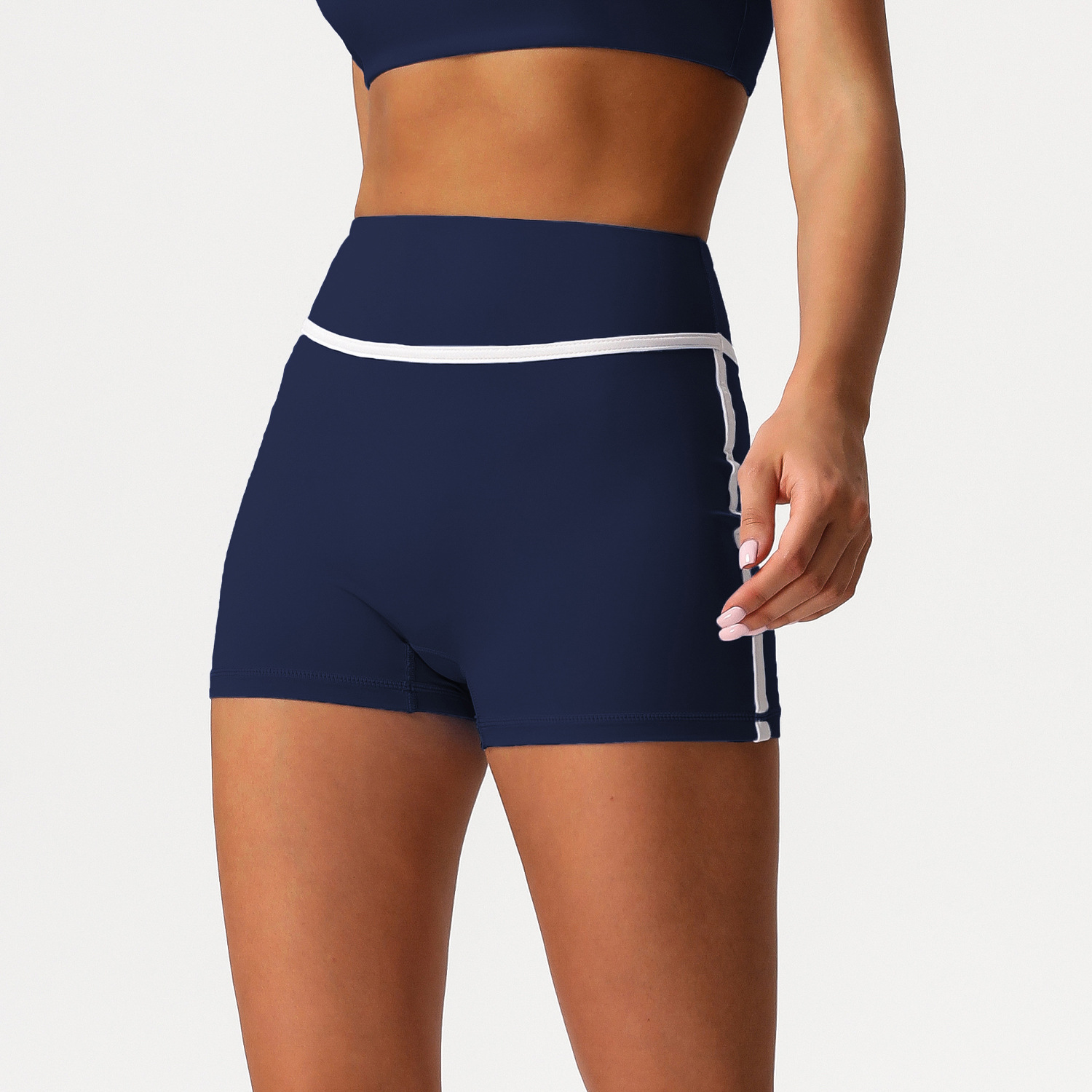 Pantalones cortos de yoga de cintura alta y abdomen de color de contraste europeo y americano