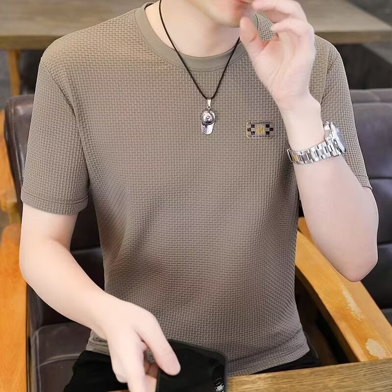 T-shirt de manga corta marca de moda masculina de verano suelta manga de cinco puntos 2026 nueva tendencia en línea in simple impresión superior