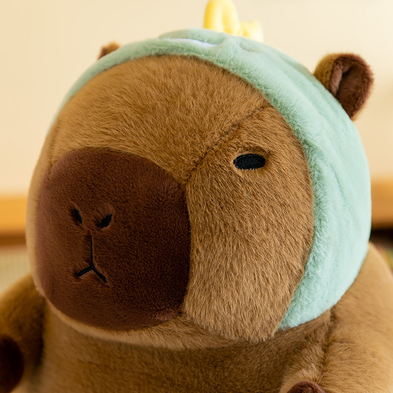Caricatura capibara almohada manta dos en uno Carpibara cojín aire acondicionado es de doble uso niños siesta manta regalo