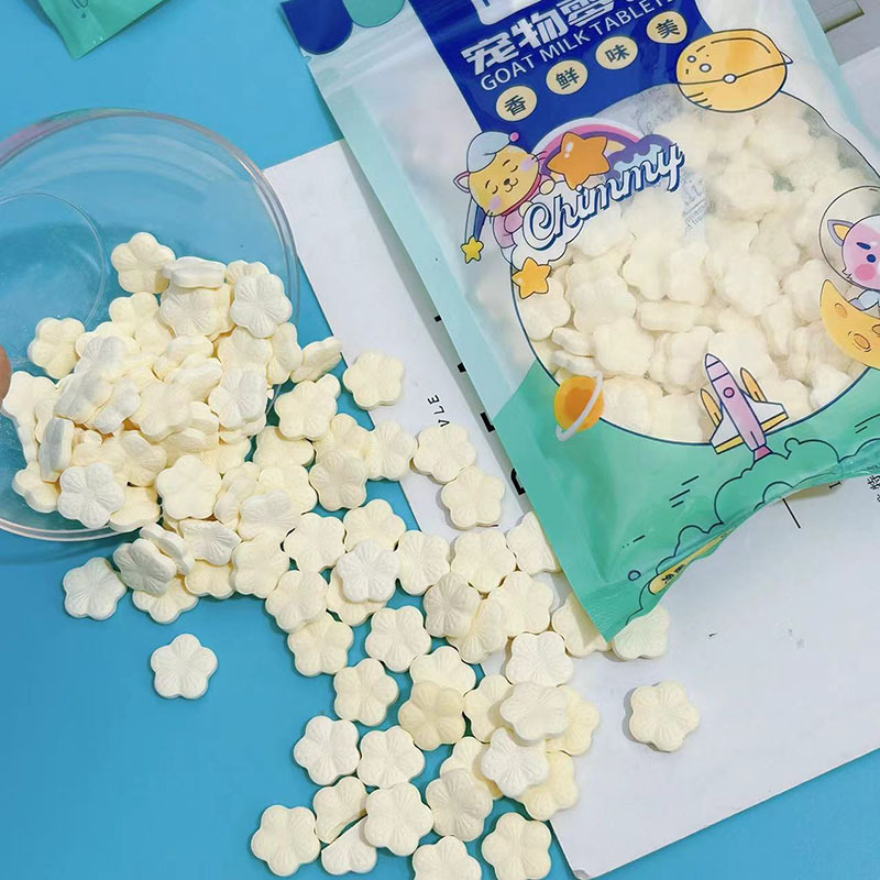 Leche de cabra para mascotas, 100g, leche de calcio con forma de flores, perros, gatos, perros, mascotas, nutrientes y bocadillos de calcio.