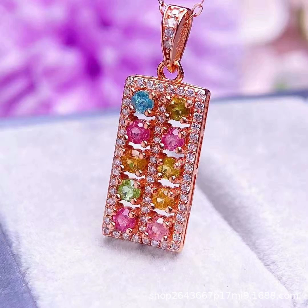 Organic tourmaline pendant, stone inlay, silver 925 sample, style