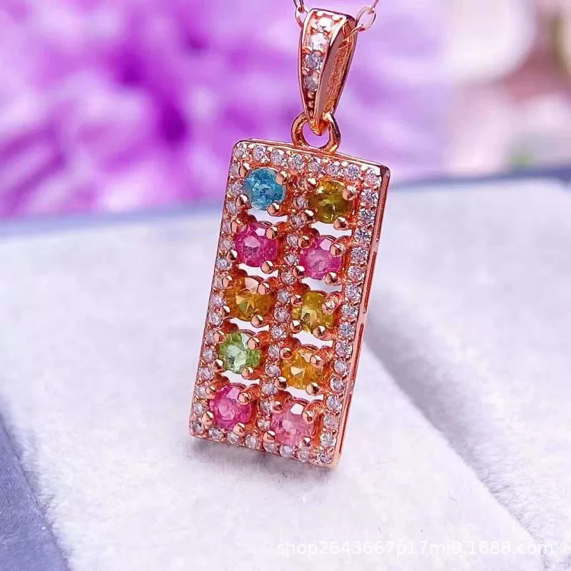 Organic tourmaline pendant, stone inlay, silver 925 sample, style