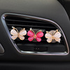 Metal transport with butterfly, perfume, decorations