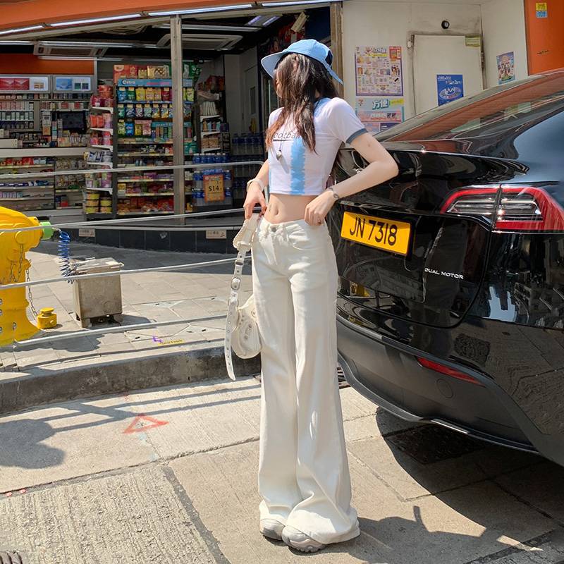 批发辣妹白色低腰圆口袋设计微喇牛仔裤女春夏修身弹力直筒喇叭裤