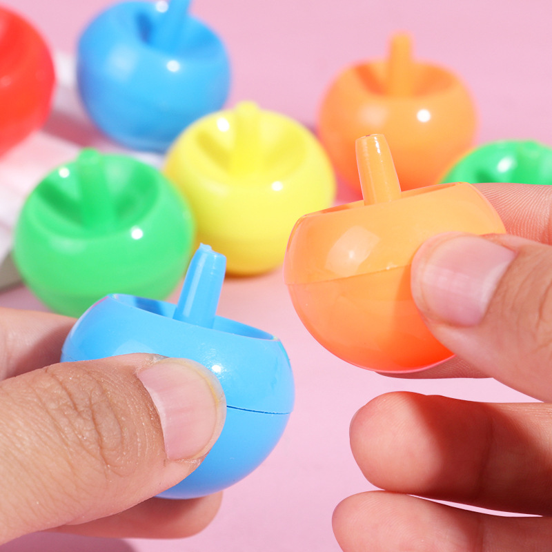 Mercado nocturno de Qiankun invertido, giroscopio, mini giratorio de manos, pequeño puesto de juguetes giratorio, juguetes para niños, giroscopio de manzana