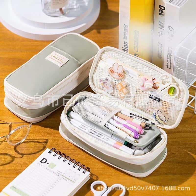 Bolsa de bolígrafo de gran capacidad para estudiantes de primaria simple serie de macarón bolsas de bolígrafo de separación multicapa multifuncional caja de papelería de alto valor facial