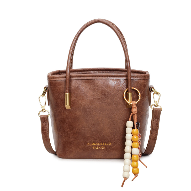 Bolso de cuentas retro de moda para mujeres 2025, nuevo bolso de mano de alto nivel, bolso de hombro de estilo exterior