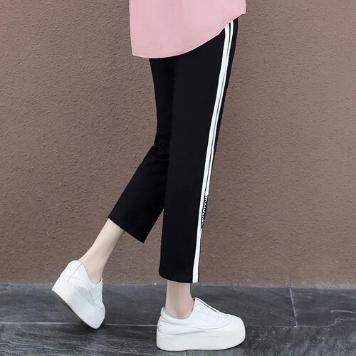 High-waist slit sport pants for women 2026 spring collection side striped harem pants for a slimmer fit plus-size elastic eight-inch casual pants