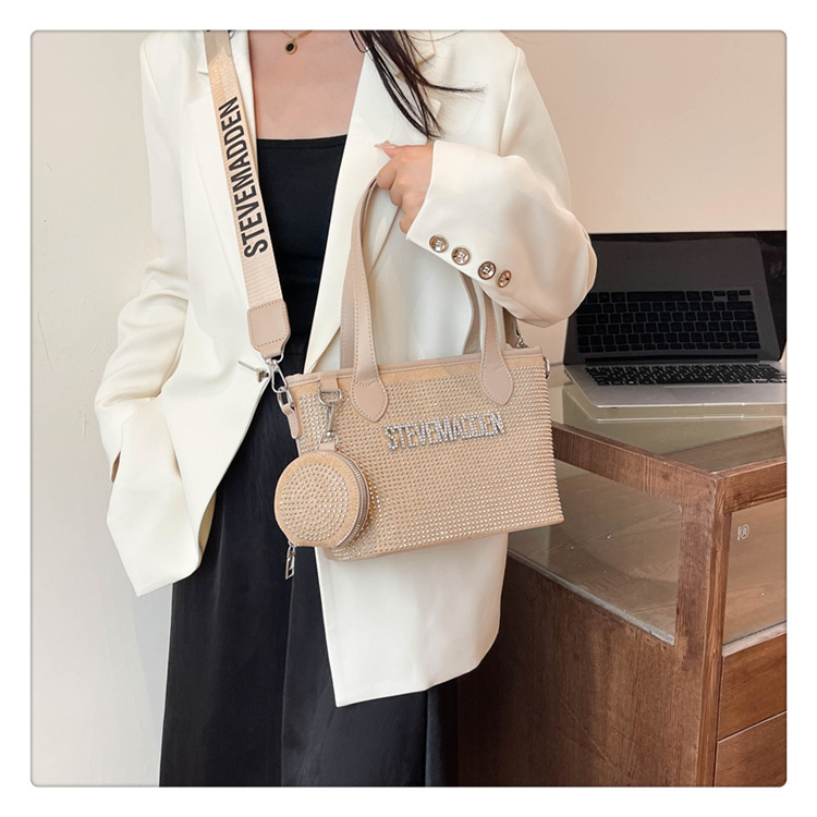 Bolso de letras de diamantes de imitación transfronterizos diseño de nicho femenino moda simple portátil popular 2025 nueva textura bolsa de mensajero