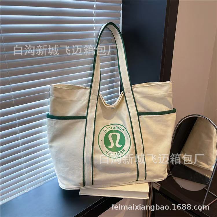 外贸女包2025春夏季新款简约休闲帆布包流行字母托特斜挎包bags潮|undefined