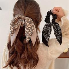 Floral celebrity-inspired headband with sweet and sophisticated charm, butterfly bow and tassel, suitable for women, French retro Korean style wide headband.