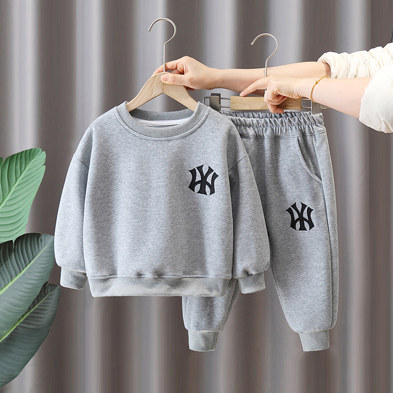 7093 niños 2025 primavera nuevo traje primavera suéter de manga larga de dos piezas para niños estilo coreano primavera y otoño estilo occidental