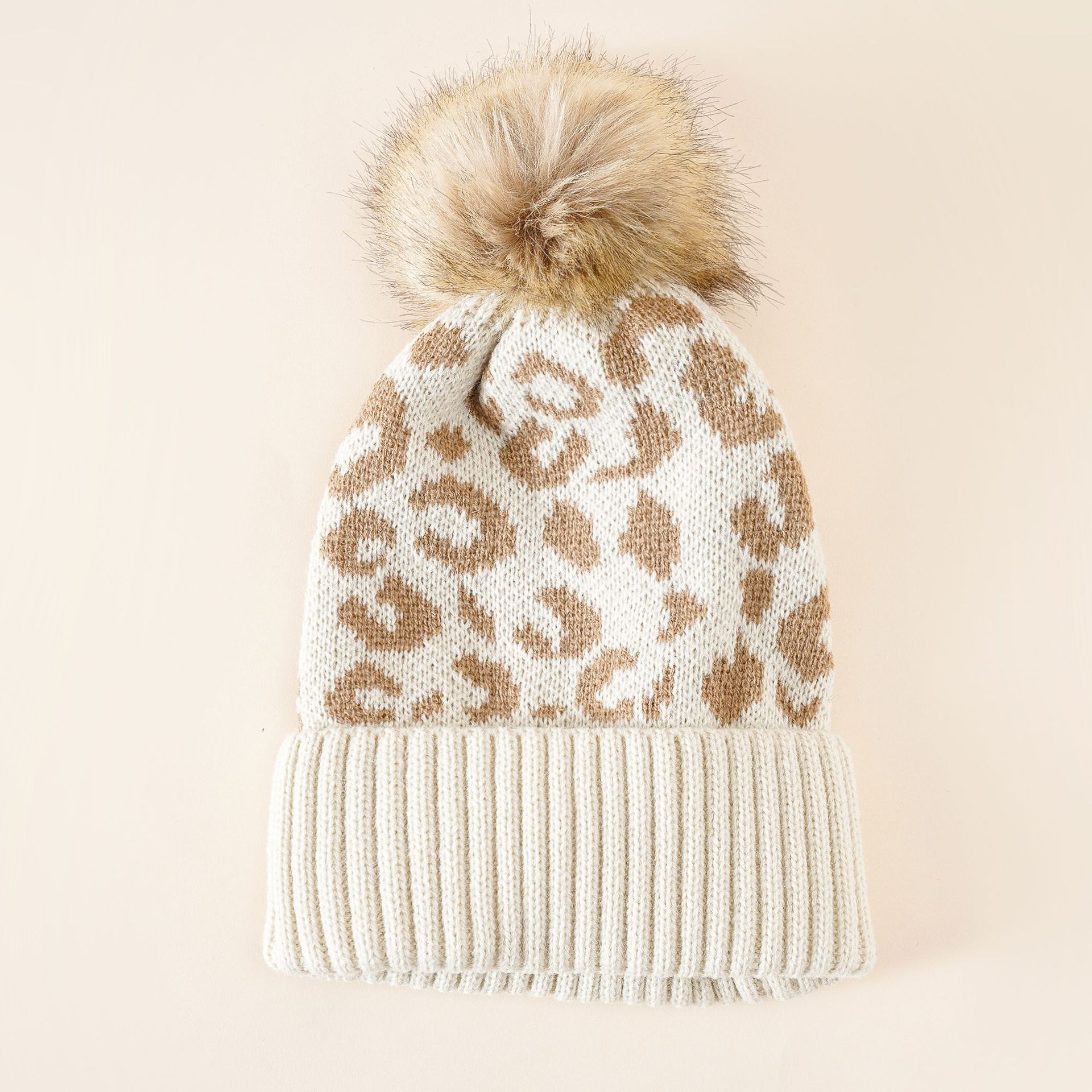 Sombrero de punto sombrero Otoño e Invierno leopardo impresión Bola de piel caliente moda estilo coreano estudiante casual Internet celebridad lana sombrero femenino Masculino