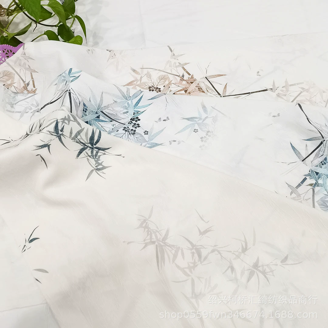 2025 new fabrics, elegant bamboo leaf embossed jacquard fabric, four-sided stretch dark pattern jacquard clothing fabric wholesale
