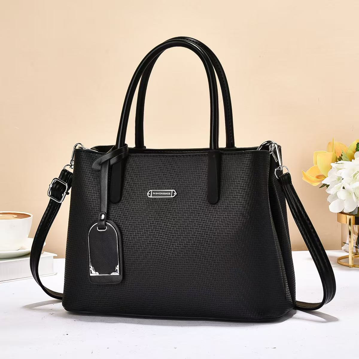 Bolso de mano de color sólido universal 2025, nuevo bolso de hombro de moda casual, mochila de transporte de gran capacidad Handbag
