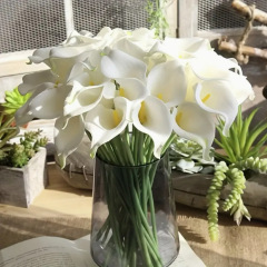 馬蹄蓮のシミュレーション花PU手触り馬蹄国境を越えた結婚祝い花芸布景家庭装飾花卸売り