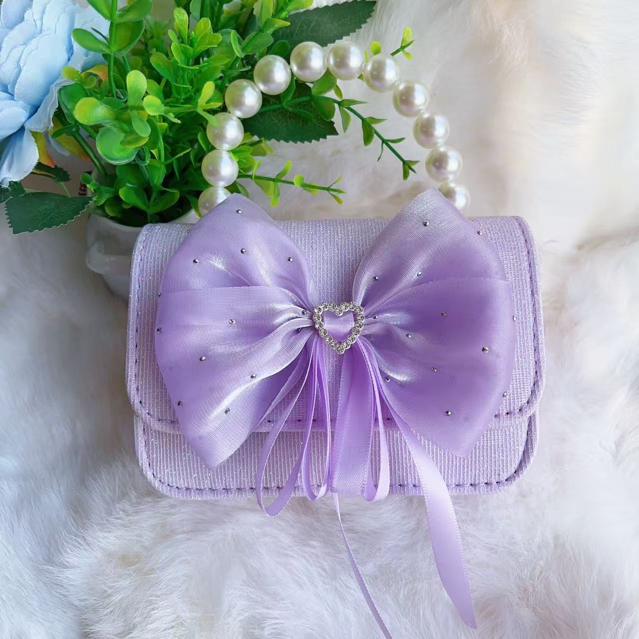 Bagos de perlas para niños 2025 nuevos bolsos de niños bolsos de mochila de niñas bolsos accesorios de princesa bolsos de viento de fragancia