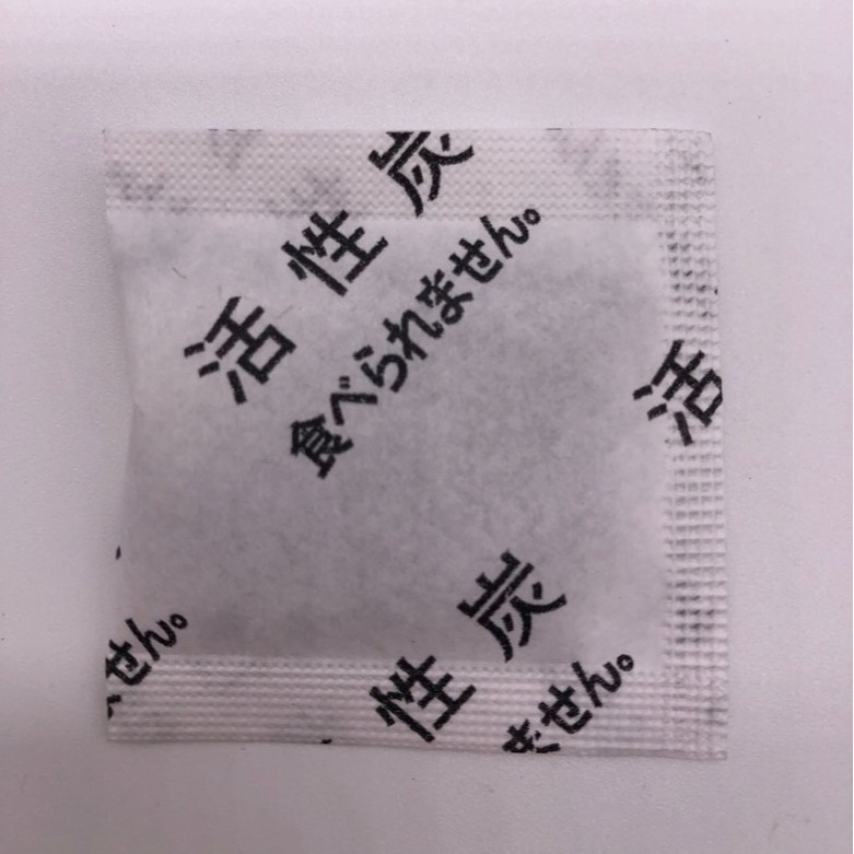 Spot 2g 3g 5g 10g chino japonés carbón activado paquete desecante taza de té paquete desodorante taza de plástico desodorante