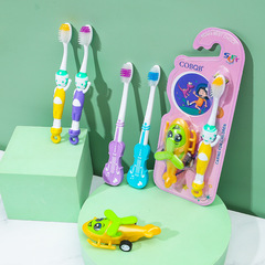 Children's toothbrush with toy cartoon packaging foreign trade export street stall 2 yuan store baby toothbrush soft bristles wholesale manufacturer