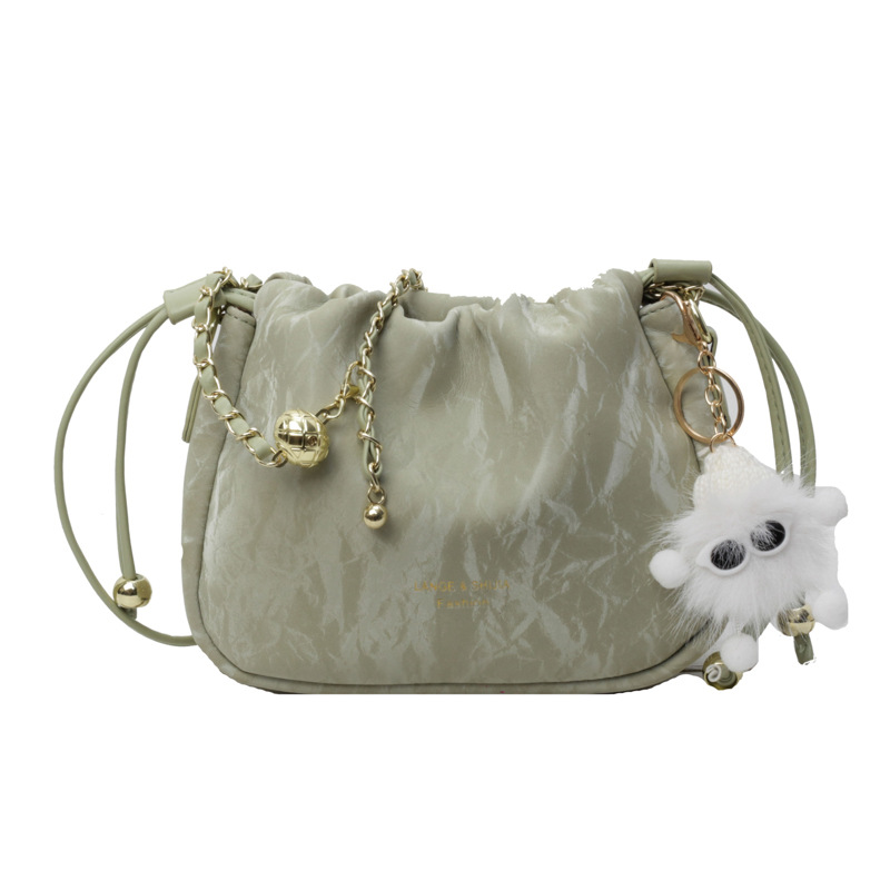 Bolsa de cordón de cadena de sentido de alta calidad para mujer 2025 nuevo bolso de hombro popular de todo fósforo bolso de cubo de textura de nicho de moda