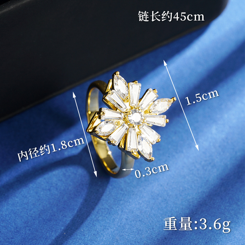 Nuevo oro de arena collar de flores de molino de viento geométrico mujer lujo ligero viento frío nicho joyería anillo fuente al por mayor