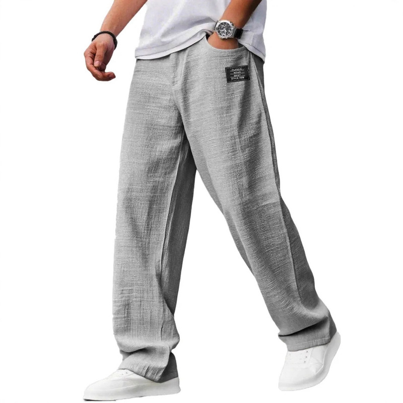 Cross-Border Men's Casual Cotton and Linen Fabric Embroidered Logo Drawstring Loose Elastic Waist Pocket Trousers Cross-Border Men's Casual Cotton and Linen Fabric Embroidered Logo Drawstring Loose Elastic Waist Pocket Trousers