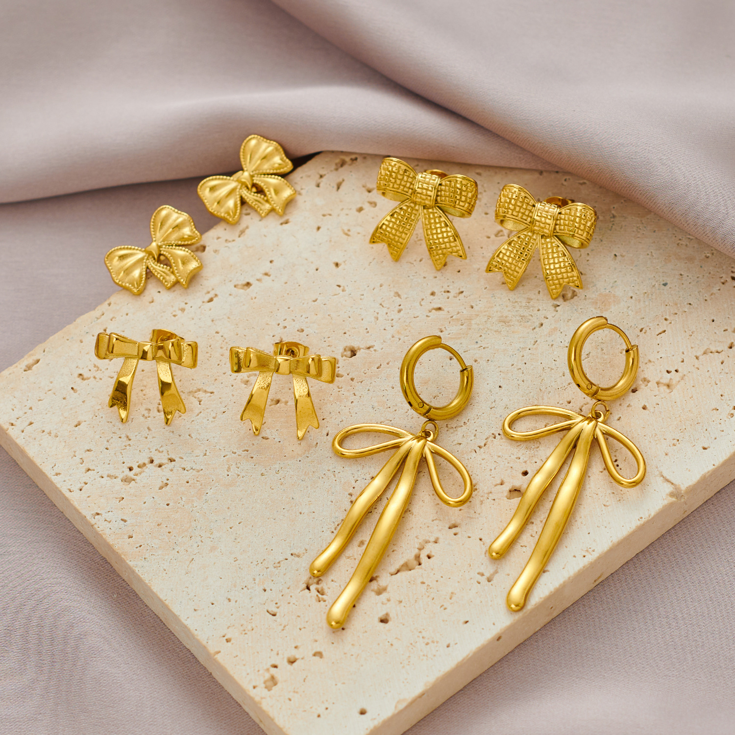 fashionable earrings with bow stainless steel