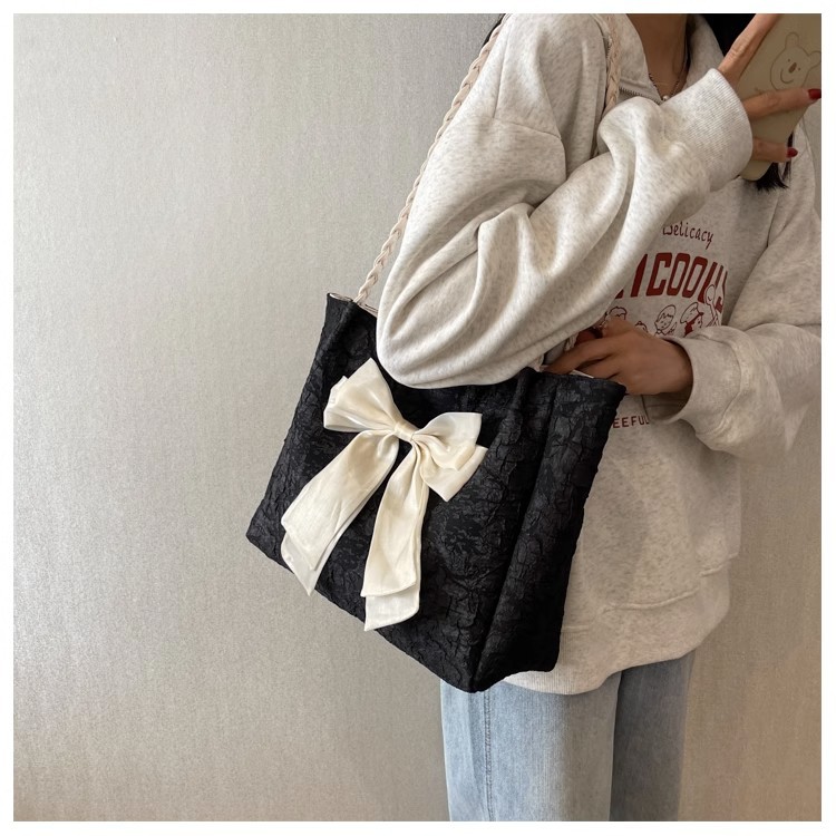 Large-capacity bow bag for women, 2023 new trendy, fashionable and sweet single-shoulder bag, student commuting tote bag undefined