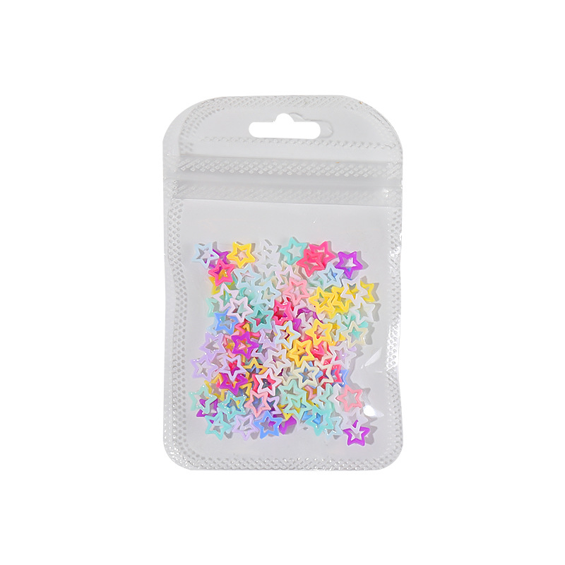 Red en línea mezcla hueco de color dopamina pentagonal amor joyas de uñas joyas de uñas de corazón de桃ar al por mayor