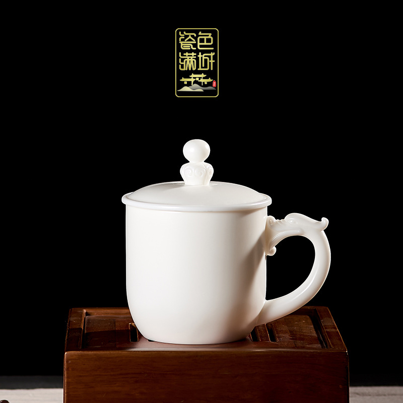 Porcelana color Mancheng Dehua porcelana blanca con tapa filtro oficina con revestimiento de separación taza de agua taza de té grande de cerámica personal