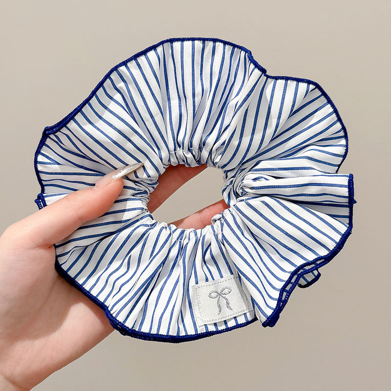 Pastoral viento intestino anillo de cabello mujer 2025 nuevo estilo de alta sensación bola de cabello cuerda de cabeza flor dulce princesa adornos de cabello cuerda