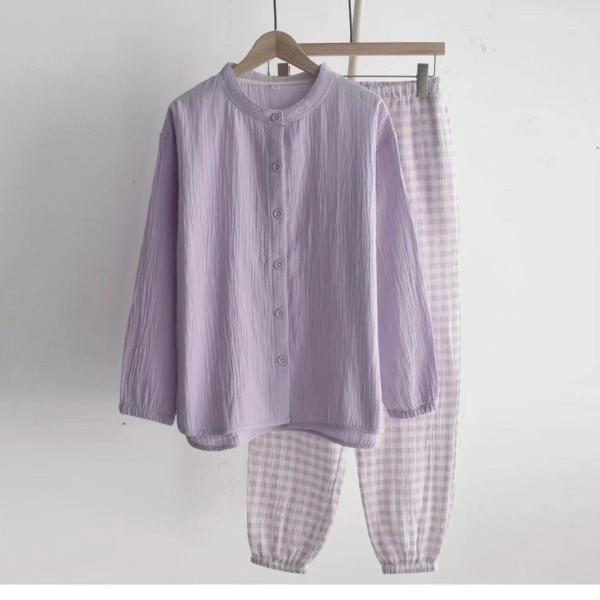 Pijamas transfronterizos al por mayor para mujer primavera y otoño imitación algodón Zou tela manga larga cardigan de color sólido traje de servicio a domicilio sentido de alta gama se puede usar afuera