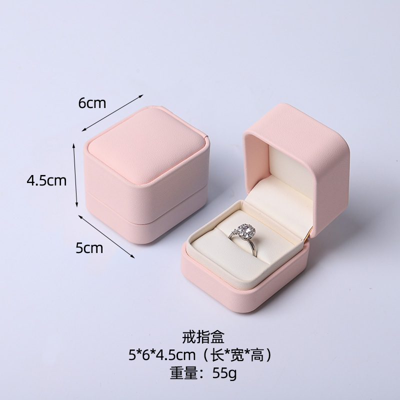 Caja de joyería rosa de alta calidad de cuero pu caja de embalaje de marca de joyería logotipo colgante pulsera collar caja de anillo