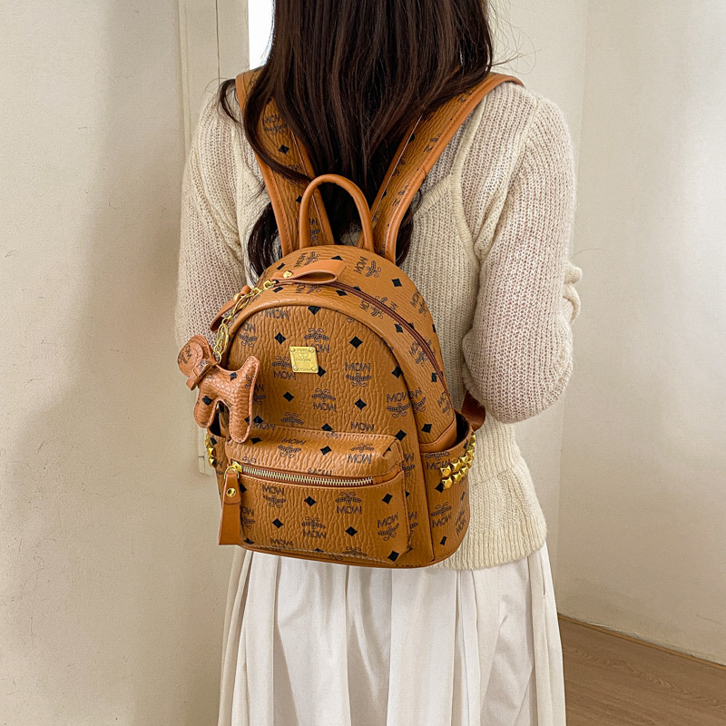 New m Brand Rivet Backpack, Fashionable and Casual, European and American Style Letter Design, Casual Travel Backpack, Large Capacity Student School Bag New m Brand Rivet Backpack, Fashionable and Casual, European and American Style Letter Design, Casual Travel Backpack, Large Capacity Student School Bag