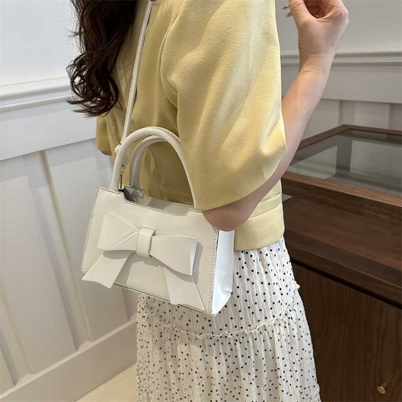 Bolso de moda coreano para mujeres 2024 nuevo arco de viento dulce bolso pequeño nicho bolso de hombro