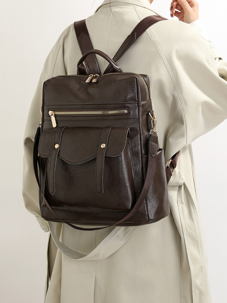 Mochila de cuero suave de comercio exterior transfronterizo para mujeres nuevo estilo retro moda británica universal mochila roja PU ocio de mediana edad