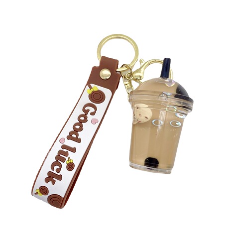 Internet celebrity cartoon oil floating pearl milk tea bear keychain female cute trendy car key chain school bag pendant