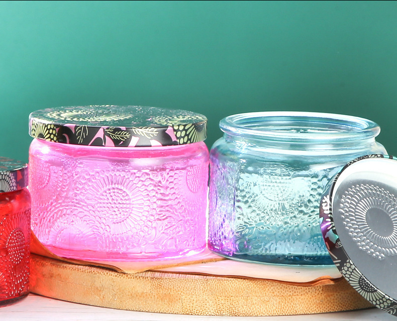 复制_圆形玻璃香薰蜡烛杯太阳花浮雕家居罐带盖子.jpg